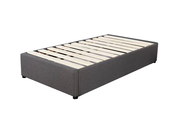 Long single bed base in charcoal with two drawers and solid pine slats.